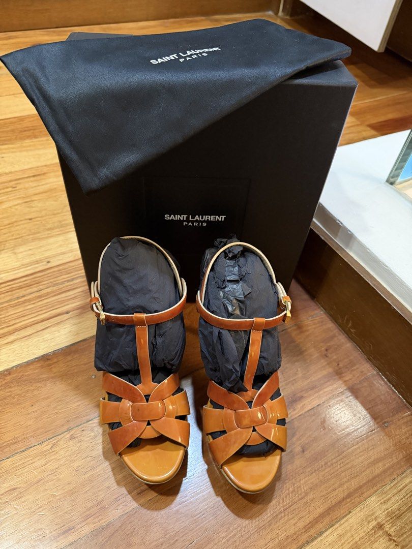 Saint Laurent Paris Tribute Platform Sandals Size 37 (Category: Sneakers & Footwear) located in Manila. Submitted by mts7890 (Listing ID 1446104335, Image 1). Description: - Authentic Saint Laurent Paris Tribute Platform Sandals - Color: Glossy Tan/Brown - Size: 37 - Made in Italy - Includes original box and dust bag.