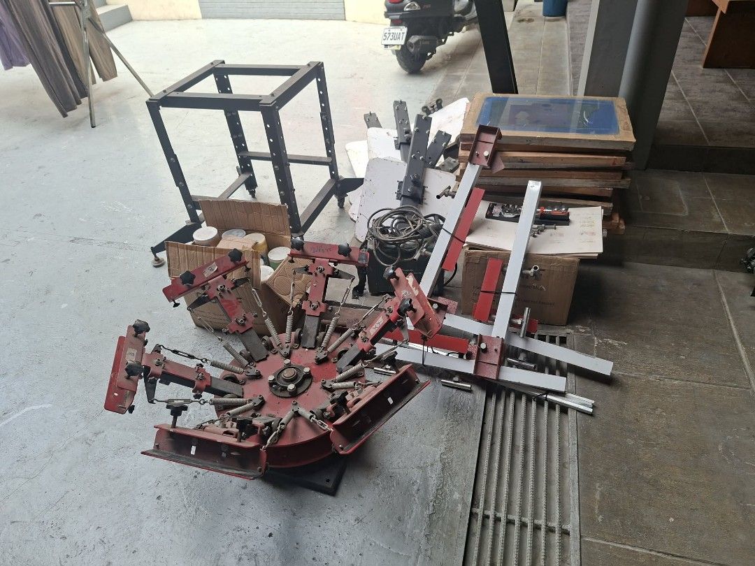 Screen Printing Machine with Stand and Screens (Category: Printers, Scanners & Copiers) located in Angono. Submitted by 227pmkapparel (Listing ID 1446084789, Image 1). Description: - Complete screen printing setup - Multi-station rotary press included - Sturdy stand for the press - Several screens provided - Ideal for starting a new venture or expanding a small workshop - Some components are disassembled - Sold in its current condition (as is).