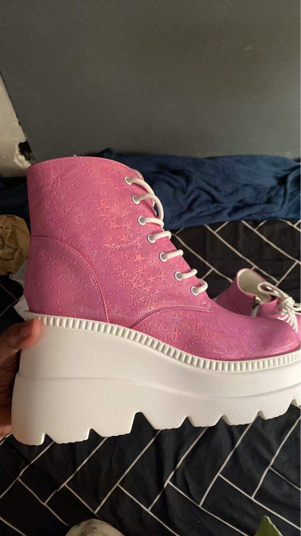 Shein Pink Star Platform Combat Boots (Category: Boots) located in Cavite. Submitted by curatedluxury (Listing ID 1446062982, Image 2). Description: - Adorable pink platform combat boots - Features a fun holographic star pattern all over - Lace-up front with a convenient side zipper - Chunky, stylish white platform sole - Perfect for adding a playful touch to any outfit - Gently used, worn only a few times.