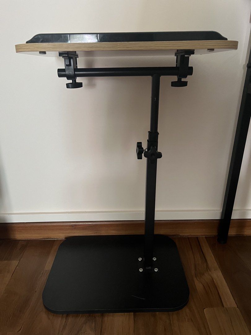 Small adjustable table (Category: Tables & Sets) located in Singapore. Submitted by szeyin.goh (Listing ID 1446035911, Image 1). Description: Self collection only Dimension: 40x30cm, height (45-80cm).