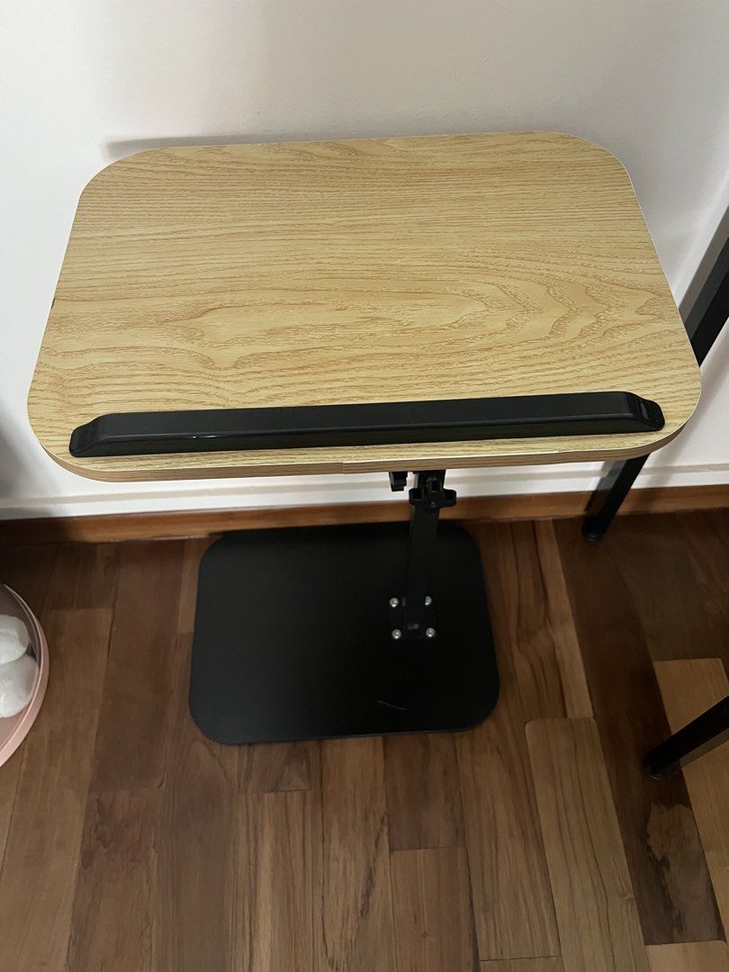 Small adjustable table (Category: Tables & Sets) located in Singapore. Submitted by szeyin.goh (Listing ID 1446035911, Image 2). Description: Self collection only Dimension: 40x30cm, height (45-80cm).