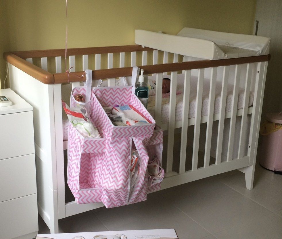 Solid wood cotbed (Category: Cots & Cribs) located in Singapore. Submitted by rubypumps (Listing ID 1446010015, Image 1). Description: This is a cot bed, it can be converted to toddler bed, so you will need a 140x70cm mattress, I bought mine from Mothercare. Cot has 3 levels of height adjustment, sides cannot be lowered hence it’s very safe. This is a very good cotbed, solid wood, very sturdy, no creaky wood sound or shaky. Does not come with dia