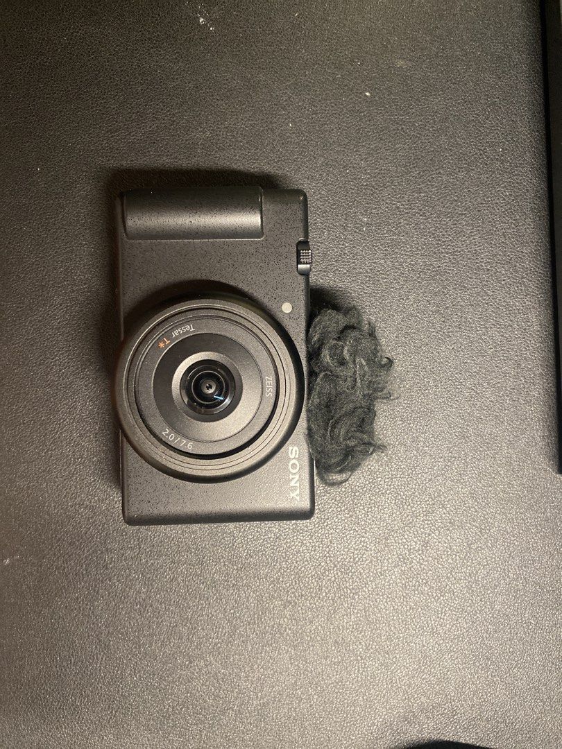 Sony ZV-1F Digital Camera with Microphone Windscreen (Category: Cameras) located in Naga. Submitted by iamspeed (Listing ID 1446142465, Image 1). Description: - Sony ZV-1Fcamera, ideal for vlogging & content creation. - Comes with a furry windscreen for enhanced audio. - Features a flip screen for effortless shot framing. - Compact and portable design for on-the-go use. - Ready to elevate your next project!.
