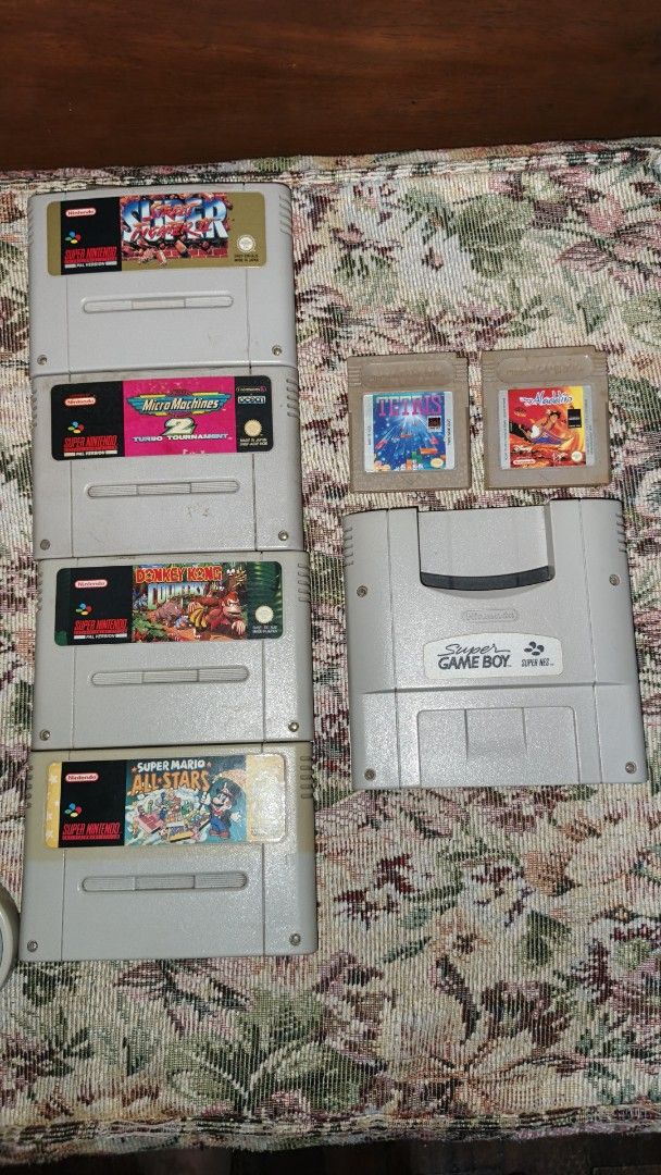 Super Nintendo Entertainment System SNES PAL version (Category: Nintendo) located in Las Pinas. Submitted by filipsnew_2001 (Listing ID 1446066484, Image 3). Description: Package Inclusions: - Super Nintendo (SNES) PAL version unit - 220v power supply - Original nintendo AV cable - 2 controllers - Replaced capacitors last March 2024 Game Cartridges: -Super mario all stars -Donkey kong country -Super street fighter 2 - Micromachines -Super game bo