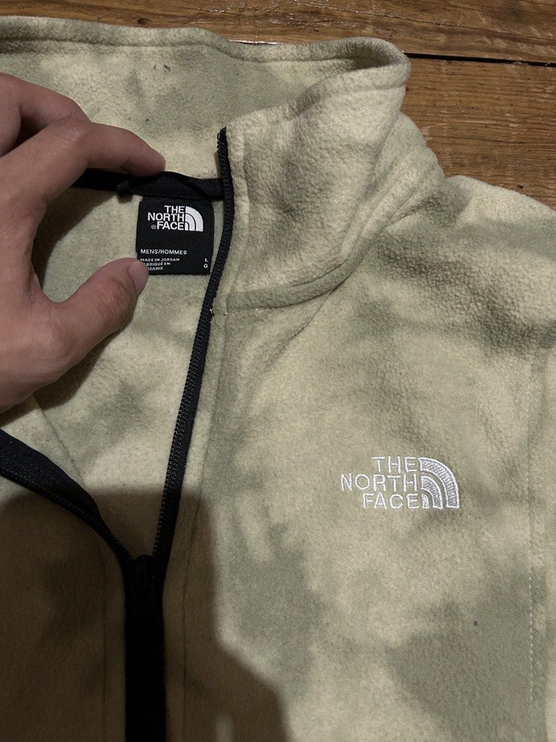 The North Face Tie-Dye Fleece Half-Zip Jacket (Category: Coats, Jackets and Outerwear) located in Baguio. Submitted by don_ben (Listing ID 1446123600, Image 3). Description: - The North Face Fleece Jacket - Unique green and beige tie-dye pattern - Half-zip closure with stand-up collar - Kangaroo pocket with side zip closures - Adjustable drawstring hem - Size: Large (L) - Dimensions: 25 x 25.