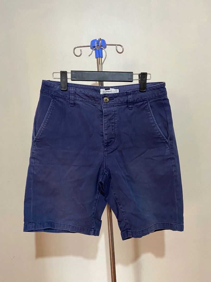 [Topman] Navy Blue Chino Shorts (Category: Shorts) located in Quezon City. Submitted by thedeclutterer_ (Listing ID 1446084568, Image 1). Description: Description: - Missing one button - Excellent condition Dimensions: Waist - 30 in Length - 36 in Shipping Options: Delivery through courier service (J&T, LBC, Flash Express) Payment Options: GCash, BPI Bank Transfer, Maribank, Maya *Can provide additional photos and videos..