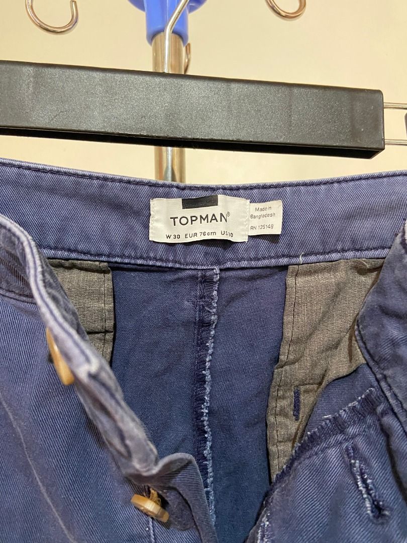 [Topman] Navy Blue Chino Shorts (Category: Shorts) located in Quezon City. Submitted by thedeclutterer_ (Listing ID 1446084568, Image 3). Description: Description: - Missing one button - Excellent condition Dimensions: Waist - 30 in Length - 36 in Shipping Options: Delivery through courier service (J&T, LBC, Flash Express) Payment Options: GCash, BPI Bank Transfer, Maribank, Maya *Can provide additional photos and videos..