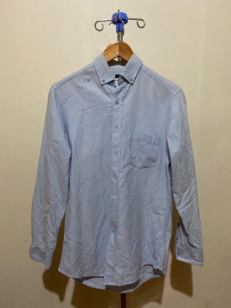 [Topman] Original Light Blue Long Sleeves Button Up Shirt (Category: Formal Shirts) located in Quezon City. Submitted by thedeclutterer_ (Listing ID 1446033096, Image 1). Description: Description: - Very minimal yellowing of collar (will try to remove it before shipping) - Lightly used - Excellent condition (will iron the clothes and provide proof) Dimensions: Shoulder Width - 40 cm / 15.7 in Length - 76.5 cm / 30 in Sleeves Length - 58.5 cm / 23