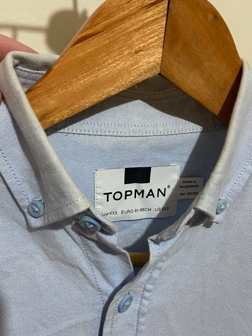 [Topman] Original Light Blue Long Sleeves Button Up Shirt (Category: Formal Shirts) located in Quezon City. Submitted by thedeclutterer_ (Listing ID 1446033096, Image 2). Description: Description: - Very minimal yellowing of collar (will try to remove it before shipping) - Lightly used - Excellent condition (will iron the clothes and provide proof) Dimensions: Shoulder Width - 40 cm / 15.7 in Length - 76.5 cm / 30 in Sleeves Length - 58.5 cm / 23