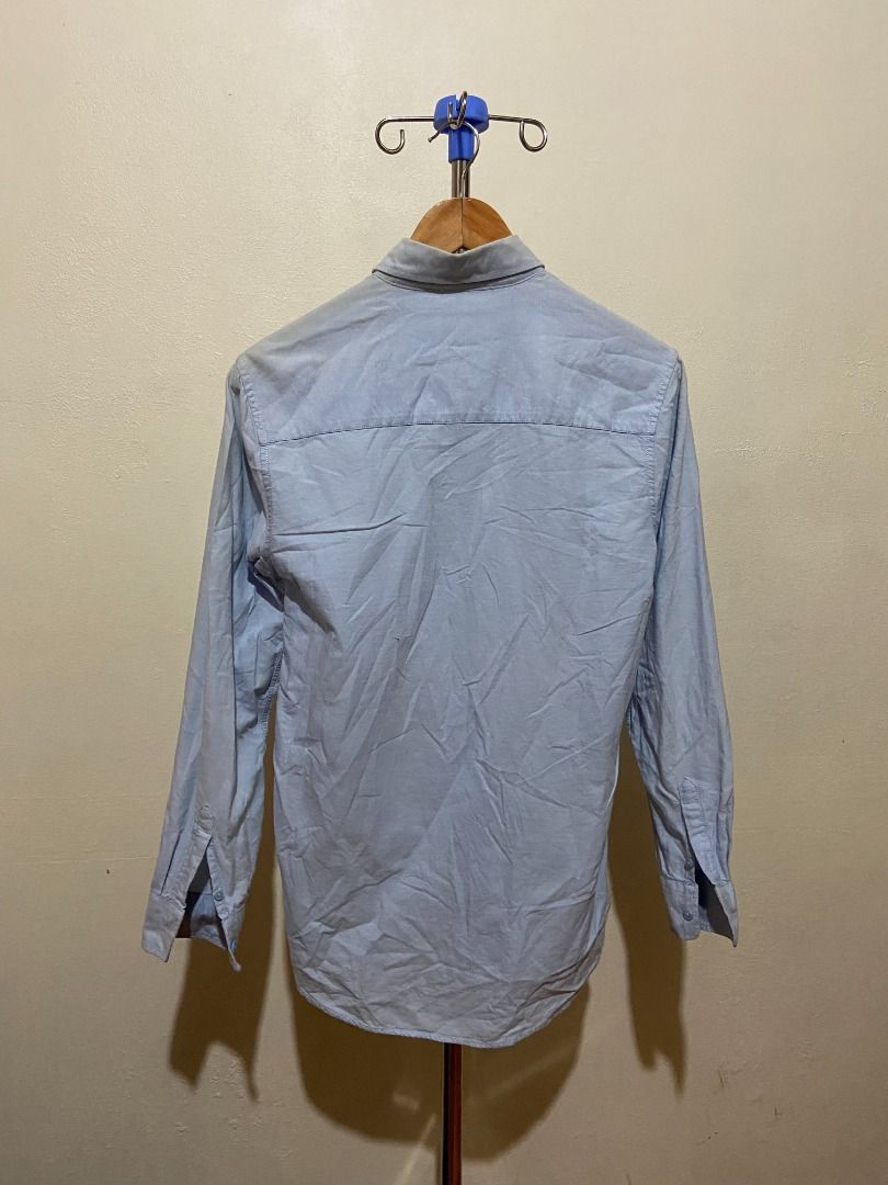 [Topman] Original Light Blue Long Sleeves Button Up Shirt (Category: Formal Shirts) located in Quezon City. Submitted by thedeclutterer_ (Listing ID 1446033096, Image 3). Description: Description: - Very minimal yellowing of collar (will try to remove it before shipping) - Lightly used - Excellent condition (will iron the clothes and provide proof) Dimensions: Shoulder Width - 40 cm / 15.7 in Length - 76.5 cm / 30 in Sleeves Length - 58.5 cm / 23