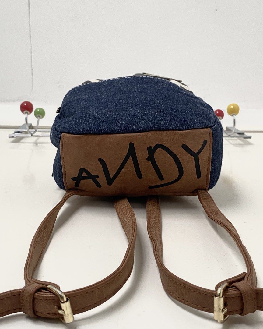 Toy Story Woody Mini Bag Backpack (Category: Backpacks) located in Manila. Submitted by kdclutter (Listing ID 1446046381, Image 3). Description: Toy Story Woody Mini Backpack - Cute statement piece - Woody Detailed Design on the Bag - “Andy” name printed on the Bottom Part of the Bag - Adjustable Strap - 10/10 Condition (Like New) - Nego!! DM for more Deets!!.
