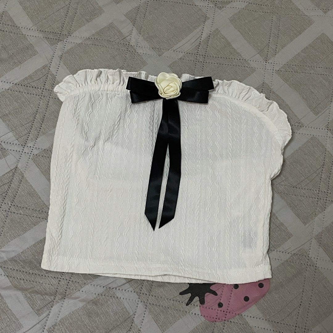 Tube Top Coquette Ribbon (Category: Sleeveless) located in Rizal. Submitted by ksbentables (Listing ID 1445996449, Image 1). Description: size: xs FIXED PRICE mop: gcash/maya mod: lalamove loc: cainta rizal note: colors may change due to lighting manage your expectations since these are preloved items.