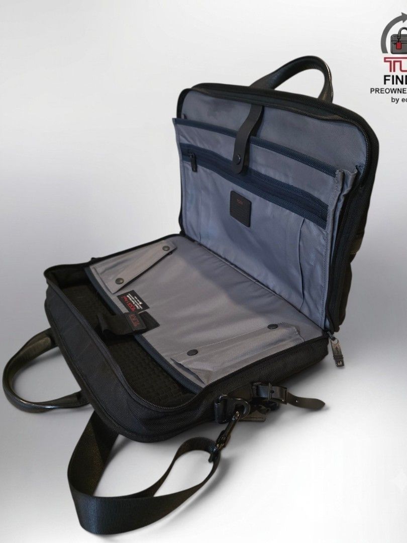 Tumi Alpha 2 Expandable Briefcase Laptop Bag Black (Category: Luxury Bags & Wallets) located in Cabuyao City. Submitted by swiftdeer.ed9787 (Listing ID 1446013799, Image 2). Description: Tumi Alpha 2 Expandable Organizer Laptop Briefcase in black ballistic nylon.Material: Made from durable FXT ballistic nylon with leather accents.Features: Includes front U-zip pockets, a waterproof pocket for umbrellas, and an Add-a-Bag sleeve.Capacity: Designed 