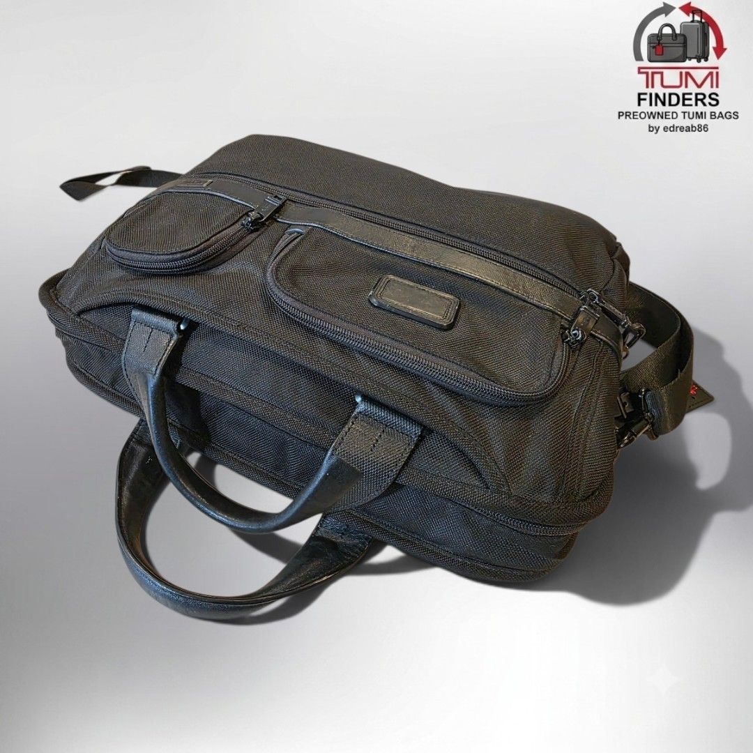 Tumi Alpha 2 Expandable Briefcase Laptop Bag Black (Category: Luxury Bags & Wallets) located in Cabuyao City. Submitted by swiftdeer.ed9787 (Listing ID 1446013799, Image 3). Description: Tumi Alpha 2 Expandable Organizer Laptop Briefcase in black ballistic nylon.Material: Made from durable FXT ballistic nylon with leather accents.Features: Includes front U-zip pockets, a waterproof pocket for umbrellas, and an Add-a-Bag sleeve.Capacity: Designed 