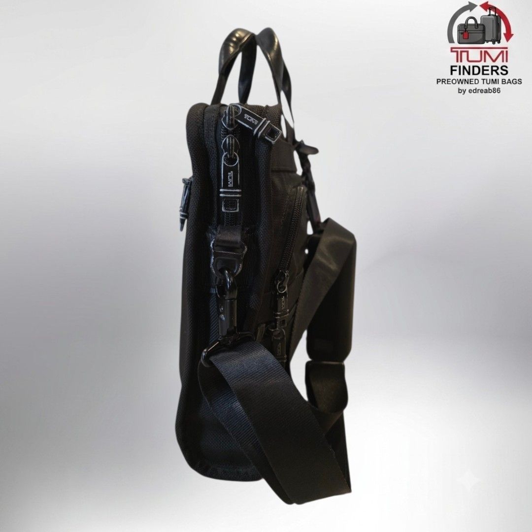 Tumi Black Nylon Briefcase Laptop Bag (Category: Briefcases) located in Cabuyao City. Submitted by swiftdeer.ed9787 (Listing ID 1446014578, Image 2). Description: for sale Authentic preowned price: 6500 Location: Cabuyao Lagina Condition: used in perfect condition - Brand: Tumi - Color: Black - Material: Durable Nylon - Features: Top handles, detachable shoulder strap - Organization: Multiple zippered compartments - Capacity: Ample space for lapt