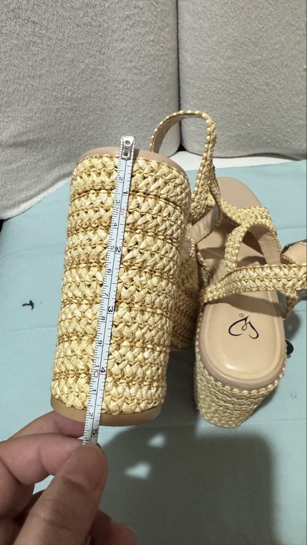 Wedge Sandals / Wedge heels / Beige heels (Category: Wedges) located in Quezon City. Submitted by gcc216 (Listing ID 1446036270, Image 3). Description: - High wedge sandals from Windsor store , Sacramento - Woven straw-like texture on platform and straps. - Straps cross over the foot with an adjustable buckle. - 'Luxe Fit Plush Support Foam' insole for comfort. - Perfect for any outfit. - Bought this in the US and never used it. - Size: 8 1/2 .