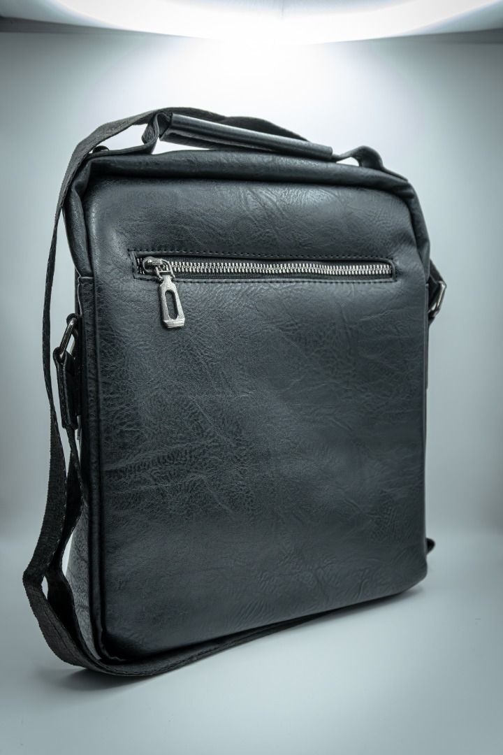 WEIXIER Crossbody Shoulder Bag (Category: Luxury Bags & Wallets) located in Silang. Submitted by melstore (Listing ID 1445997401, Image 2). Description: - Made from high-quality PU (faux) leather - Main compartment with interior zippered pocket - Adjustable shoulder strap for a comfortable fit - Additional slim side pocket for quick access - Smooth, dark fabric lining - Designed for excellent organization.