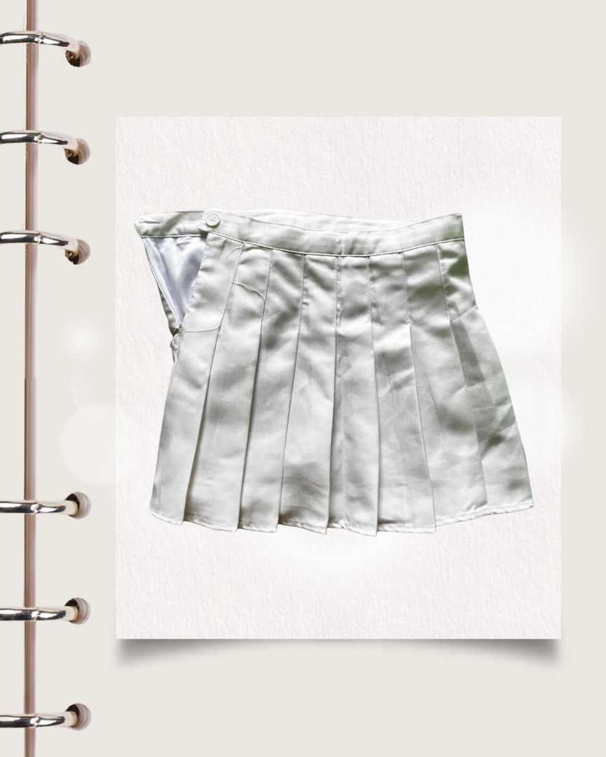 White Pleated Tennis Skirt (Category: Skirts) located in Cabuyao City. Submitted by rihtoyours (Listing ID 1446044737, Image 2). Description: 🪽A more in-depth description of the skirt shown in the photos 🪽DESIGNED WITH A CLEAN FLAT FRONT WAISTBAND AND A SECURE SIDE ZIPPER + BUTTON CLOSURE 🪽SIZE: FITS EXTRA SMALL TO SMALL.