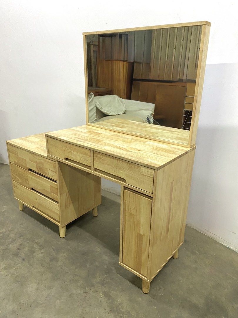 Wooden Dressing Table with Mirror and Storage (Category: Tables & Sets) located in Santa Rosa. Submitted by annie_annie83 (Listing ID 1446148243, Image 2). Description: - Solid wood construction for durability - Large, clear mirror included - Ample storage with multiple drawers and a cabinet - Beautiful, natural wood grain - Sturdy and stable design - Perfect addition to any bedroom.