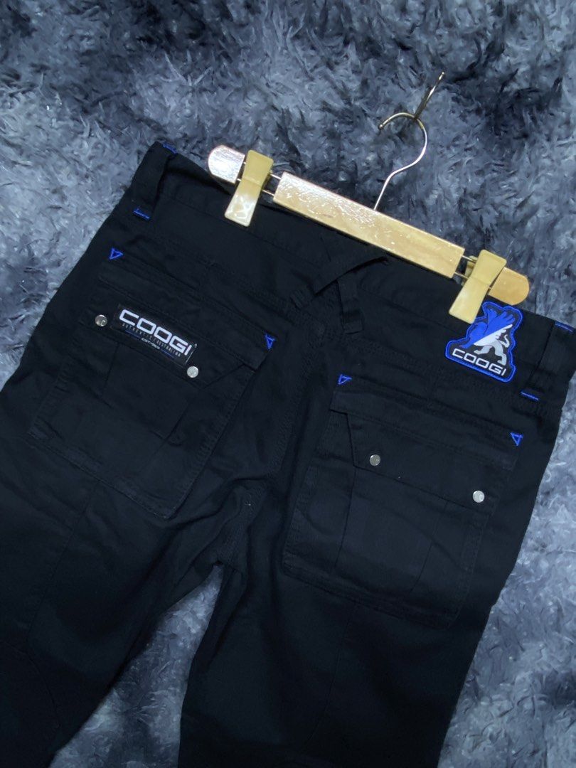 Y2k COOGIE CARGO BLACK PANTS (Category: Jeans) located in Makati City. Submitted by drip.poww (Listing ID 1446126685, Image 3). Description: - Authentic COOGI - Size: W: 32 L: 39.9 LH: 9.5 - Authentic - Excellent condition - Need wash, fresh from bale !!STILL NEGOTIABLE!!.