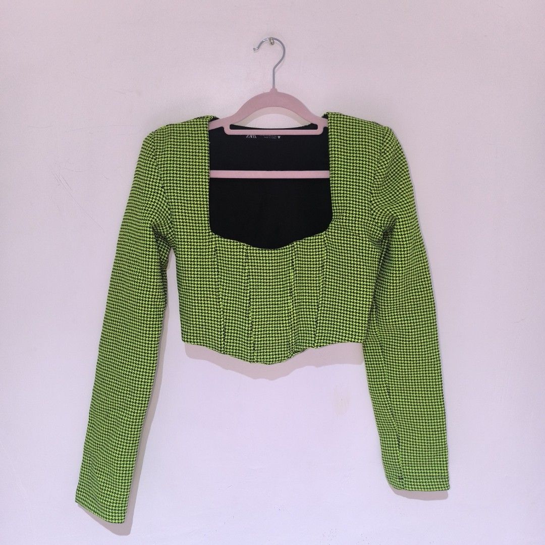 Zara Green Houndstooth Corset Crop Top (Category: Others Tops) located in Manila. Submitted by yui021 (Listing ID 1446158250, Image 1). Description: - Zara crop top with houndstooth pattern (neon green & black) - Square neckline - Long sleeves with shoulder pads - Fitted, corset-like design - RFS: Bought this here in Carousell. I love this, and I would love to keep this, but I am too flat chested 😂 Apart from that, this really looks great on. - 