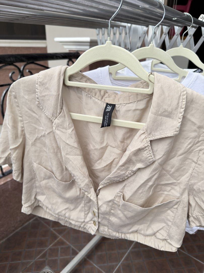 Zara Tops S-M (Category: Blouses) located in Davao. Submitted by keirousel (Listing ID 1446032853, Image 2). Description: - Take all 3 Zara tops - First top: Beige cropped shirt with collar and button front. - Second top: White ribbed top with cute ruffle sleeves. - Third top: Blouse with floral sleeve details.
