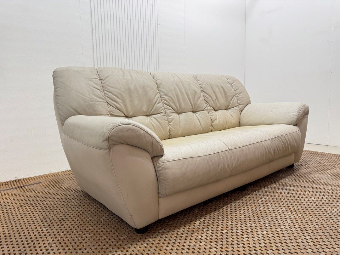 3 seater sofa (Category: Sofas) located in Quezon City. Submitted by matetdevis13 (Listing ID 1446224727, Image 3). Description: 3-Seater Off-White Leather Sofa Price: 10,900 L73 x W31 x H32/16 In good condition Code JMD45-RP61.