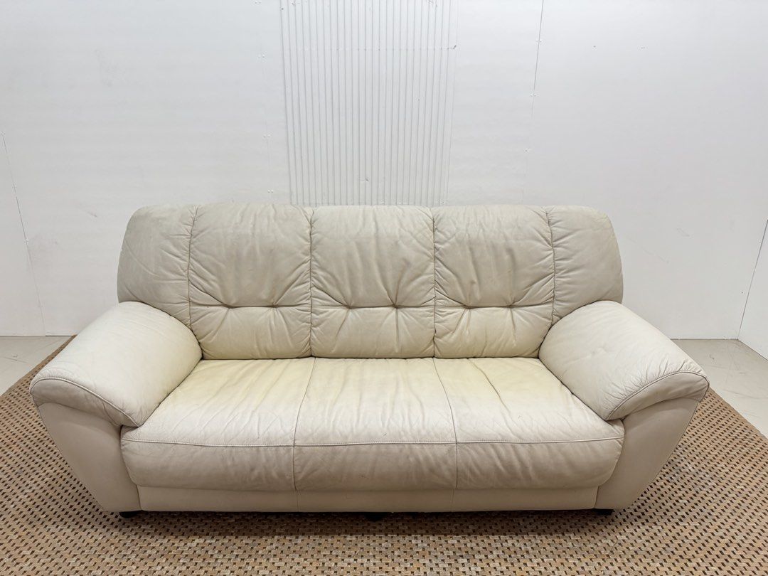 3 seater sofa (Category: Sofas) located in Quezon City. Submitted by matetdevis13 (Listing ID 1446224727, Image 2). Description: 3-Seater Off-White Leather Sofa Price: 10,900 L73 x W31 x H32/16 In good condition Code JMD45-RP61.