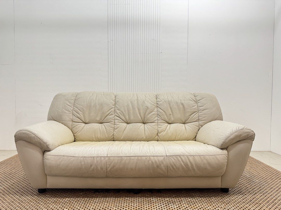 3 seater sofa (Category: Sofas) located in Quezon City. Submitted by matetdevis13 (Listing ID 1446224727, Image 1). Description: 3-Seater Off-White Leather Sofa Price: 10,900 L73 x W31 x H32/16 In good condition Code JMD45-RP61.
