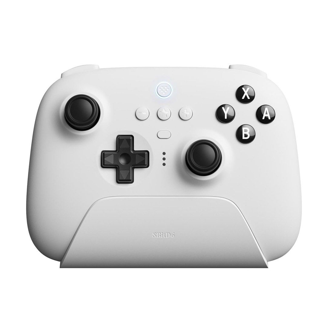 8BitDo Ultimate Bluetooth Controller White (Category: Controllers) located in Singapore. Submitted by iczelion (Listing ID 1446225583, Image 1). Description: - White 8BitDo Ultimate Bluetooth Controller - Compatible with Nintendo Switch and Windows PC - Multiple connectivity options: Bluetooth, 2.4G wireless, or USB wired - Includes charging dock for convenient power-ups - Comes with a 2.4G adapter for enhanced wireless gaming.