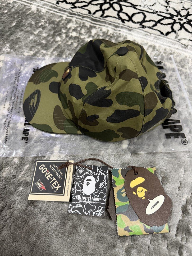 A Bathing Ape Cap 6 Panel (Category: Cap & Hats) located in Kuala Lumpur. Submitted by hameed69 (Listing ID 1446292174, Image 1). Description: ✅ free size ✅ material Gore-tex ✅ condition BNWT ✅ Postage bayar kepada J&T Bape bathing ape Cap Hat.