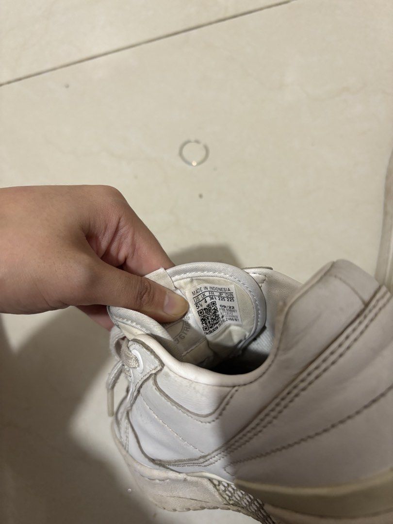Adidas Forum Bold White Sneakers (Category: Sneakers) located in Manila. Submitted by declutterwithbeyuh (Listing ID 1446173009, Image 3). Description: - White Adidas Forum Low sneakers - Classic low-top design - Shows some signs of wear on soles and leather - Laces are a bit dirty - Still has plenty of life left for casual wear.