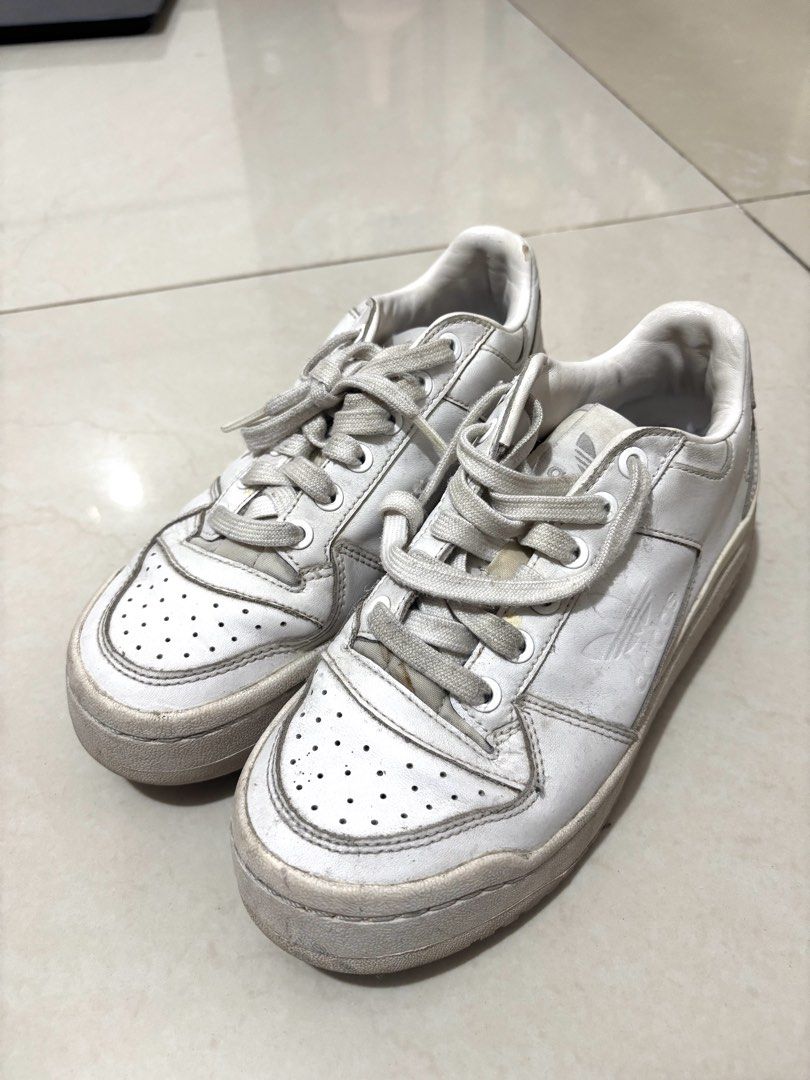 Adidas Forum Bold White Sneakers (Category: Sneakers) located in Manila. Submitted by declutterwithbeyuh (Listing ID 1446173009, Image 1). Description: - White Adidas Forum Low sneakers - Classic low-top design - Shows some signs of wear on soles and leather - Laces are a bit dirty - Still has plenty of life left for casual wear.