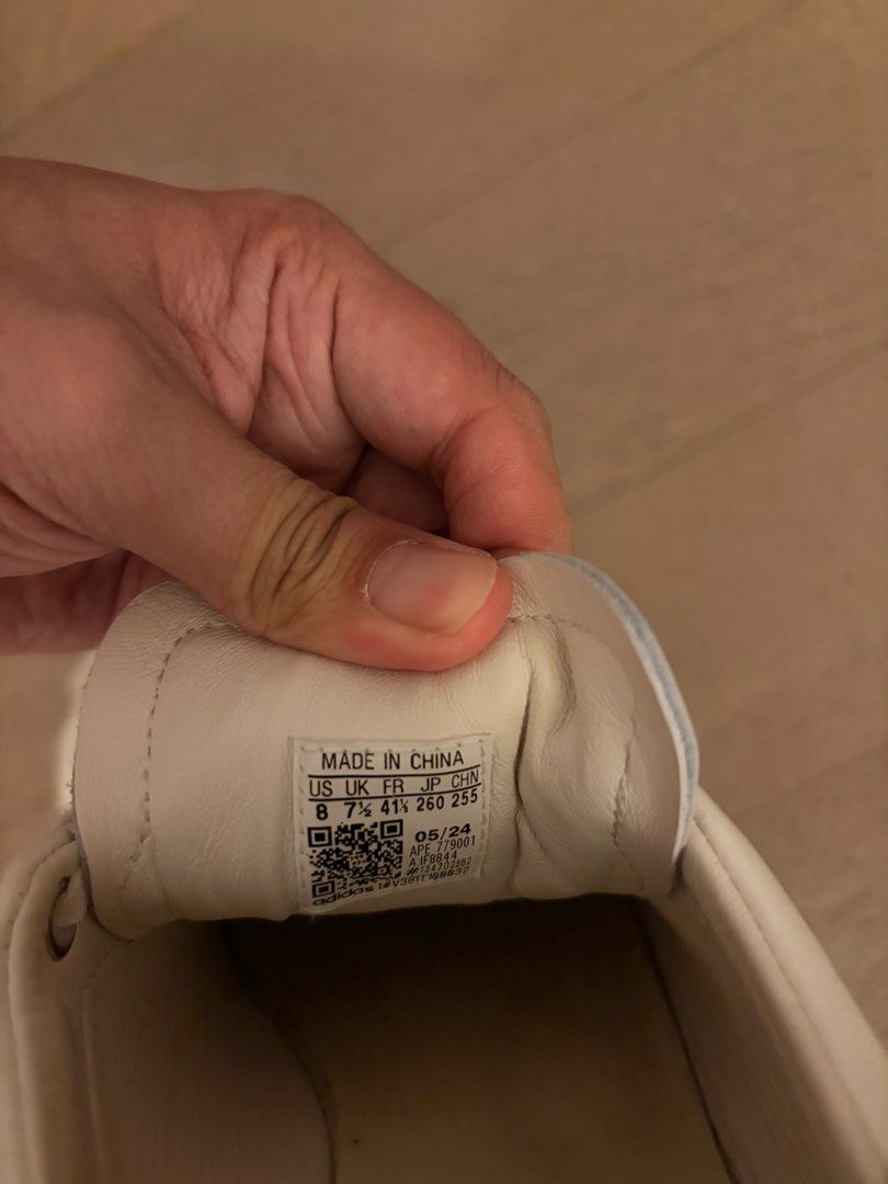 Adidas Stan Smith Luxe (Category: Sneakers) located in Quezon City. Submitted by hendrix2 (Listing ID 1446287024, Image 3). Description: - Adidas Stan Smith LUXE sneakers - Color: White leather with green heel tab - Size: US 8 fits 8.5-9 - Condition: Minor scuffs on toe box, soles have dirt but plenty of life left - Ideal for: Everyday wear.