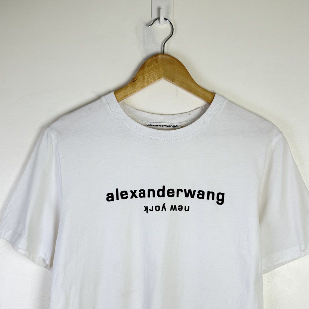 Alexander Wang White Logo T-Shirt (Category: Shirts) located in Calasiao. Submitted by liascorner (Listing ID 1446308190, Image 2). Description: S-M W:17.5 L:25.5 9.5/10.
