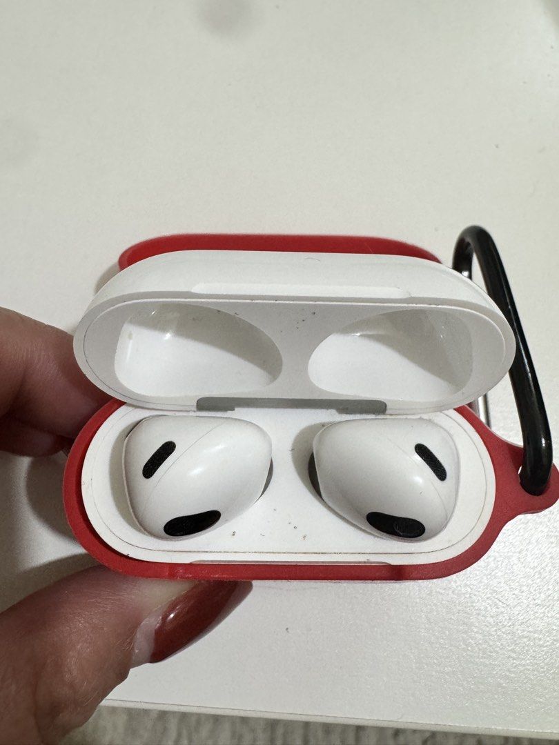 Apple AirPods 3rd Gen with Red Case (Category: Earphones) located in Manila. Submitted by elvbee (Listing ID 1446301541, Image 2). Description: - AirPods 3rd Generation - Comes with a red silicone case, box and paper bag - Case features a carabiner clip - Earbuds are white - Minor dust present inside the case and on earbuds - Sold as is - Store bought last August 2023.