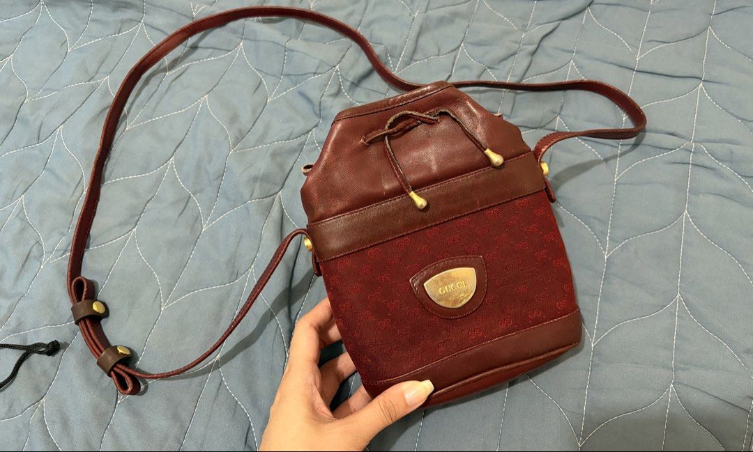 Authentic Gucci Sling Bag (Category: Luxury Bags & Wallets) located in Quezon City. Submitted by pyangyang (Listing ID 1446242331, Image 1). Description: Gucci Vintage Red Micro GG Canvas Drawstring Mini Bucket Bag negotiable .