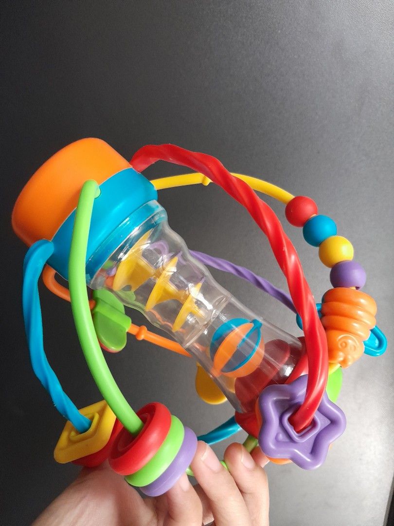 BABY ACTIVITY SENSORY BALL (Category: Infant Playtime) located in Manila. Submitted by sulitfinds_17 (Listing ID 1446237419, Image 2). Description: ✨️Preloved but GOOD CONDITION clean & sanitized. 🌈Colorful, soft plastic ball made of interlinked tubes and rings. Yung design nya parang 3D maze na pwede hawakan from any side. Key Features. 1. Easy-Grip Handles 2.Sliding Beads & Rattles 3. Textures & Shapes 4. BPA-Free Plastic Age Range: 0 to 24 mo