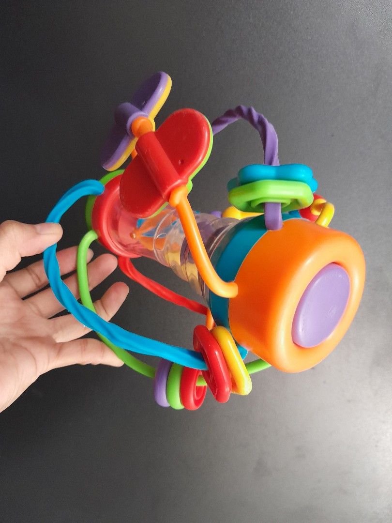 BABY ACTIVITY SENSORY BALL (Category: Infant Playtime) located in Manila. Submitted by sulitfinds_17 (Listing ID 1446237419, Image 3). Description: ✨️Preloved but GOOD CONDITION clean & sanitized. 🌈Colorful, soft plastic ball made of interlinked tubes and rings. Yung design nya parang 3D maze na pwede hawakan from any side. Key Features. 1. Easy-Grip Handles 2.Sliding Beads & Rattles 3. Textures & Shapes 4. BPA-Free Plastic Age Range: 0 to 24 mo