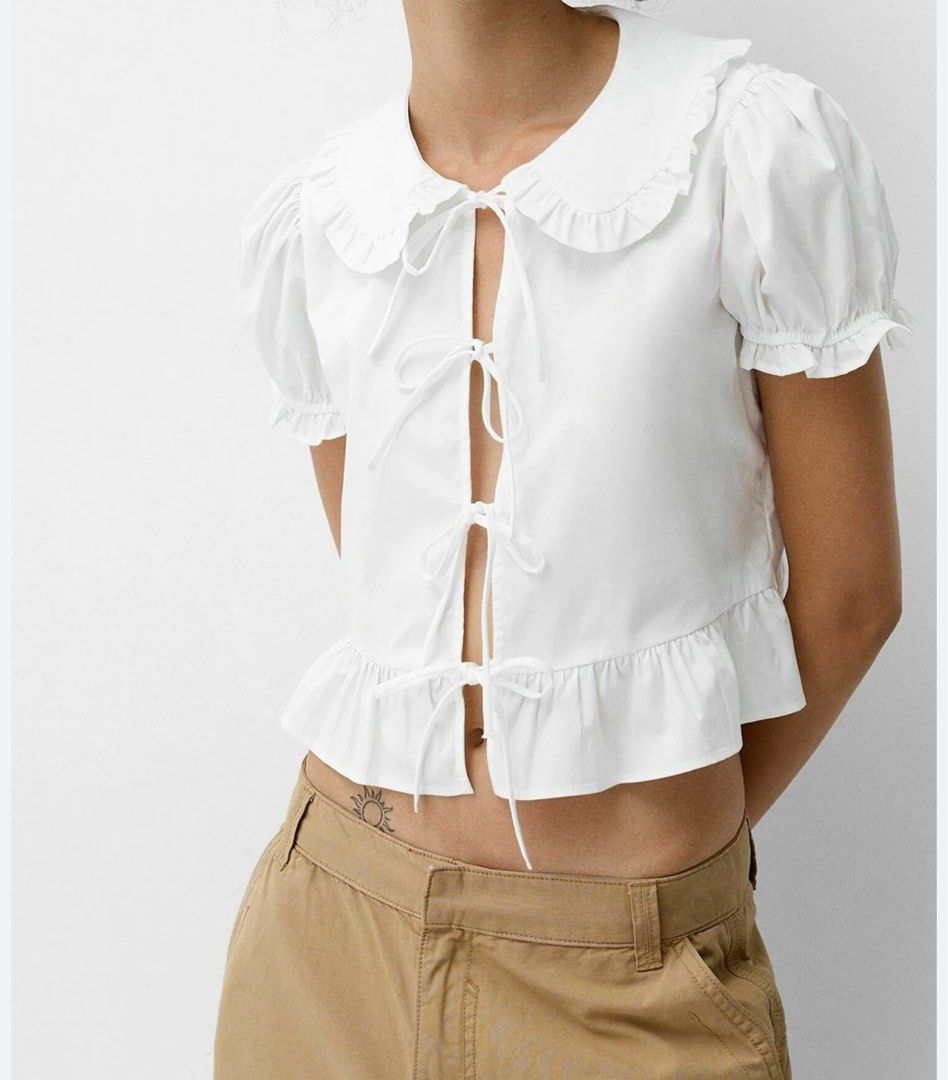 Bershka White Ribbon Top (Category: Blouses) located in Manila. Submitted by by.drea (Listing ID 1440832954, Image 1). Description: rfs: need space and closet decluttering will keep if no one gets it than lower the price - only worn once - high quality fabric - flaw yellowish near the tag but unnoticeable when worn - so pretty in pictures - originally bought this in bershka around 1.2k+ - good for small too .