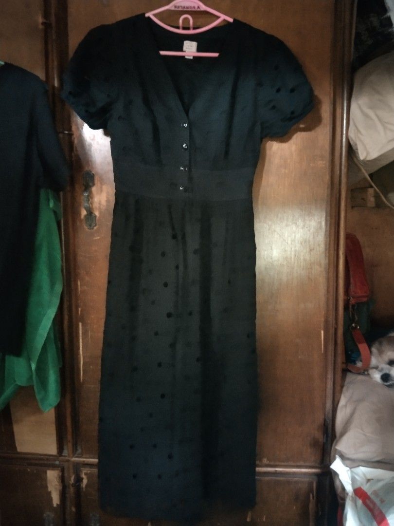 Black Eyelet Button-Front Midi Dress (Category: Dresses) located in Manila. Submitted by fiercefish.b07a25 (Listing ID 1446191469, Image 1). Description: - Elegant black midi dress - Flattering V-neckline - Stylish short puff sleeves - Functional button-front detail - Front Buttons Working - With full inner lining - Two side pockets - Delicate all-over eyelet fabric pattern - Comfortable elasticated waistband for a cinched look - Versatile for ca