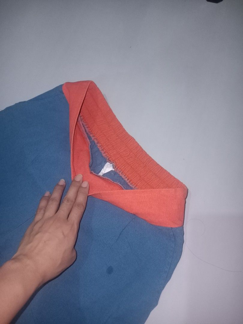Blue Pants with Orange Waistband (Category: Other Bottoms) located in Las Pinas. Submitted by ZHOEYCLOTHING (Listing ID 1446297431, Image 2). Description: - Stylish blue wide-leg pants - Features a contrasting orange elastic waistband - Ideal for everyday casual wear.