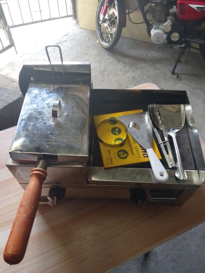 BURGER GRILL WITH FRYER AND FREEBIES (Category: Other Kitchenware & Tableware) located in Manila. Submitted by evanesce3_ (Listing ID 1446203722, Image 2). Description: — used for a month only — condition: it's good, working well, — flaw: rust freebies: tong, sanse/frying steel, plastic gloves, egg mold, stainless grilled scrapper.