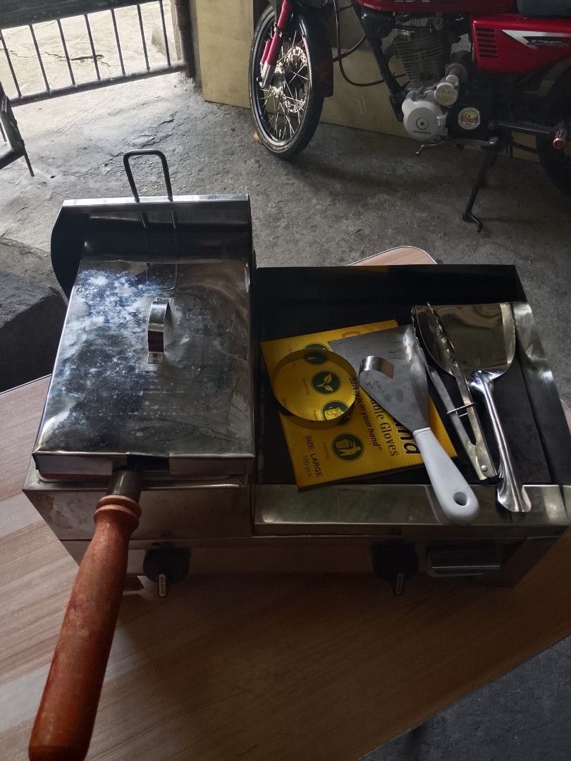 BURGER GRILL WITH FRYER AND FREEBIES (Category: Other Kitchenware & Tableware) located in Manila. Submitted by evanesce3_ (Listing ID 1446203722, Image 1). Description: — used for a month only — condition: it's good, working well, — flaw: rust freebies: tong, sanse/frying steel, plastic gloves, egg mold, stainless grilled scrapper.