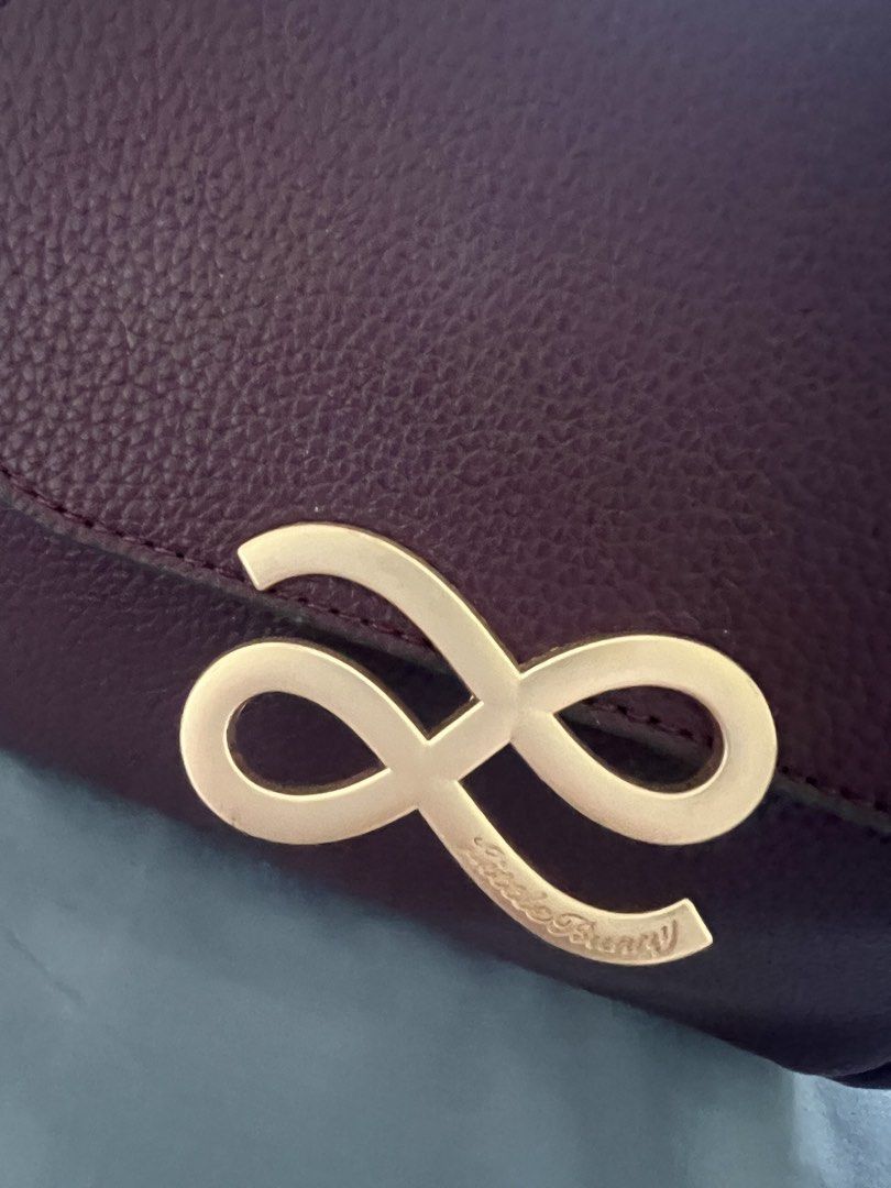 HOLB (Destiny) (Category: Luxury Bags & Wallets) located in Lucena. Submitted by ishasanjuan (Listing ID 1446206608, Image 2). Description: - burgundy - not aunthentic HOLB - Gold infinity logo on the front flap - with strap - Never been used -RFs: too many bags.