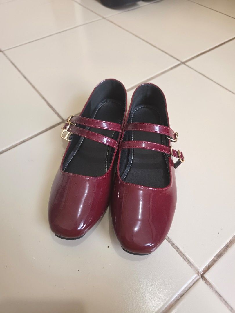 Burgundy Red Double Strap Mary Jane Flats (Category: Flats & Sandals) located in Pasig City. Submitted by cherryycloset (Listing ID 1438196679, Image 3). Description: - No box - Maroon Mary Jane flats - Glossy finish - Double straps with buckle closures - Pointed toe - Unworn condition - Comfortable and stylish - Perfect for any outfit.
