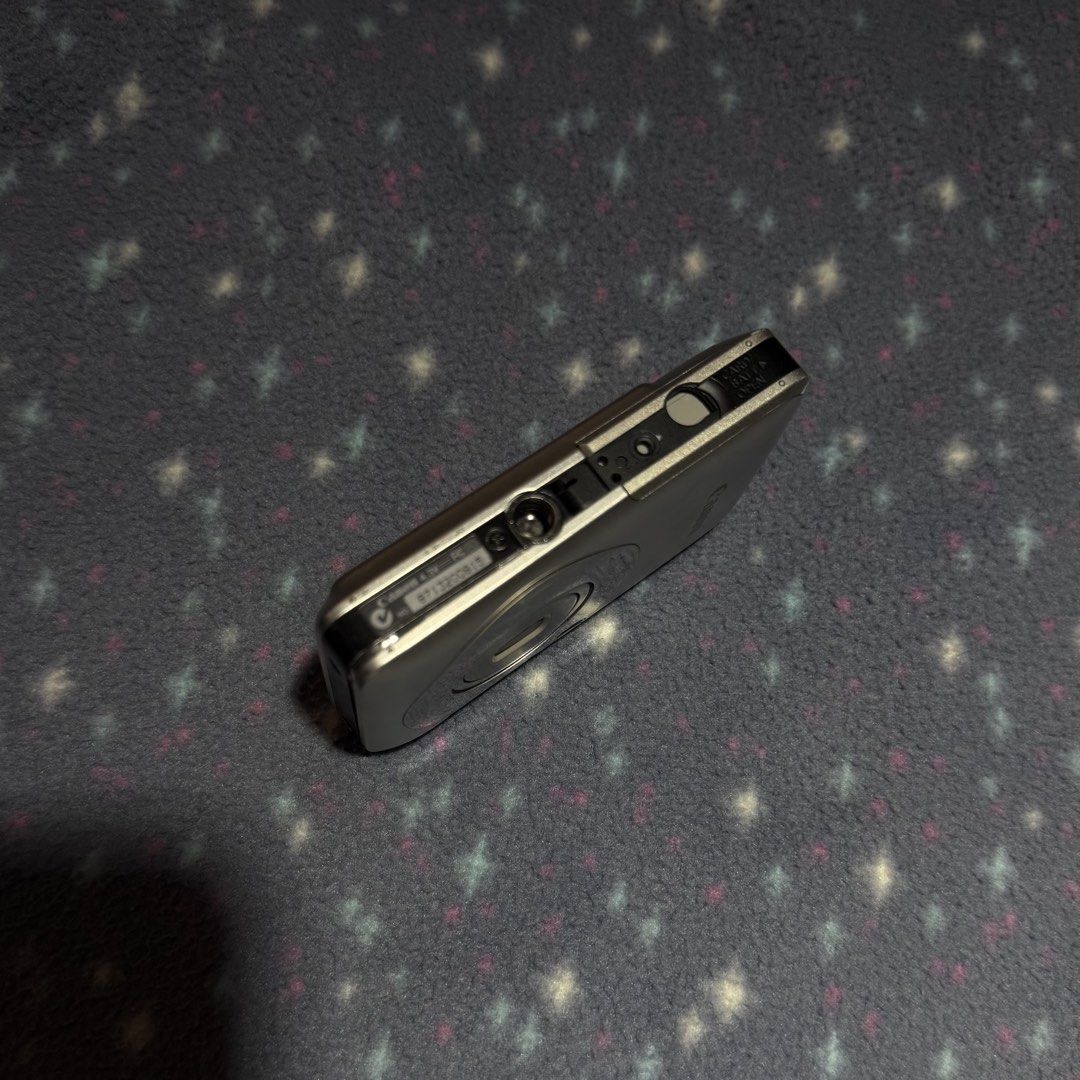 Canon IXUS DIGITAL 210 IS Silver Digital Camera (Category: Cameras) located in Quezon City. Submitted by ncstbr367 (Listing ID 1446317357, Image 3). Description: 📸 Canon IXUS DIGITAL 210 IS (Silver) ✨ Features: Compact point-and-shoot digital camera Stylish silver finish Great for collectors, repair projects, or parts Comes with original battery and charger ⚠️ Please read before buying (Issues): Minor scuffs on the body and screen Dent on the fr