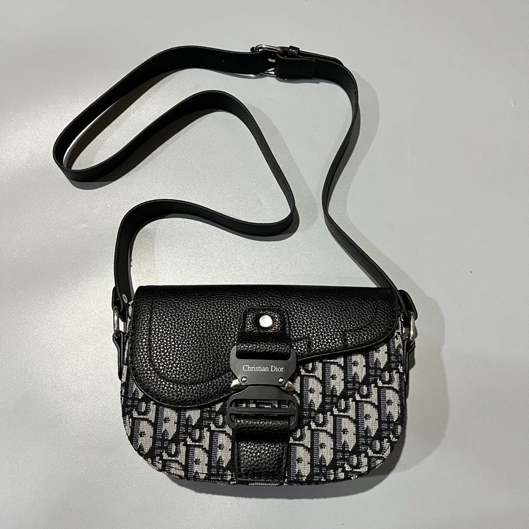 Christian Dior Mini Saddle Messenger Bag (Category: Luxury Bags & Wallets) located in Manila. Submitted by tepthirft (Listing ID 1446317048, Image 1). Description: Christian Dior Mini Saddle Messenger Bag excellent condition no issue.