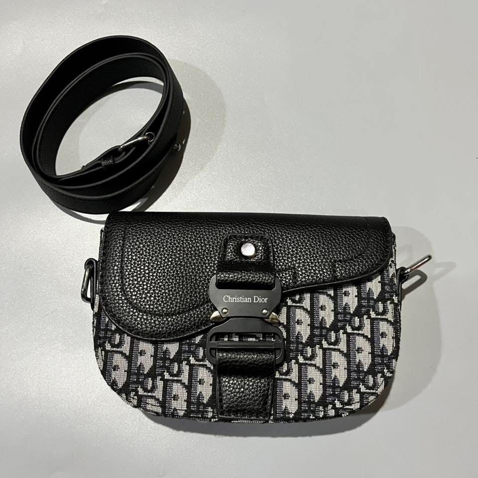 Christian Dior Mini Saddle Messenger Bag (Category: Luxury Bags & Wallets) located in Manila. Submitted by tepthirft (Listing ID 1446317048, Image 3). Description: Christian Dior Mini Saddle Messenger Bag excellent condition no issue.