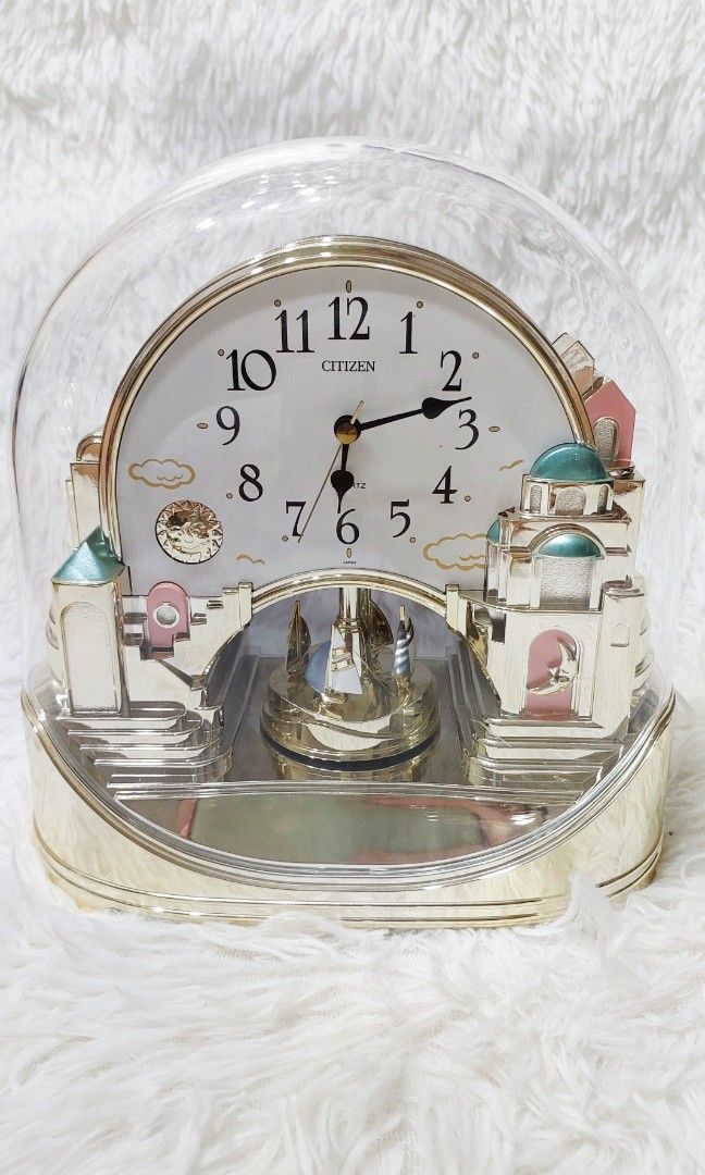 Citizen Decorative Dome Clock (Category: Clocks) located in Binan City. Submitted by sakuratreasuresph (Listing ID 1446259674, Image 2). Description: ✨ Timeless Beauty from Japan 🇯🇵🕰️ Bring a touch of elegance to your home with this preloved Citizen decorative dome clock. Featuring a charming architectural design, a crystal-clear dome cover, and a rotating pendulum, this piece is both a functional timepiece and a beautiful display accent. 🌸 A